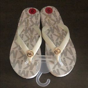 MK flip flops (size: 6)